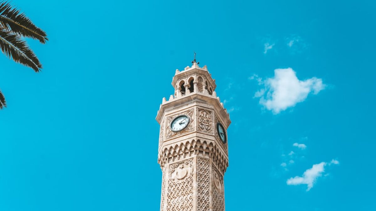 a clock tower with a bell