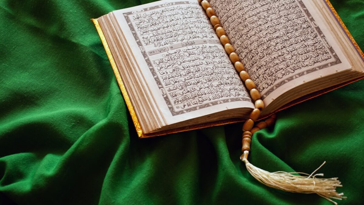 white book page on green textile