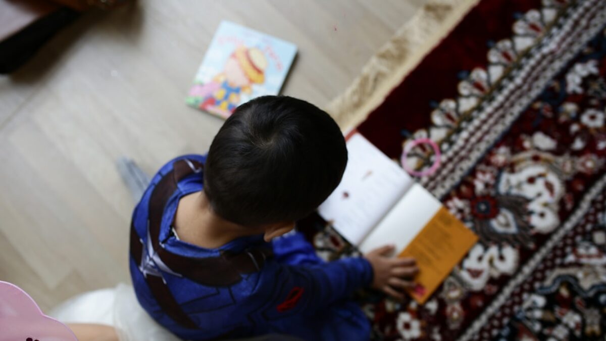 boy reading book