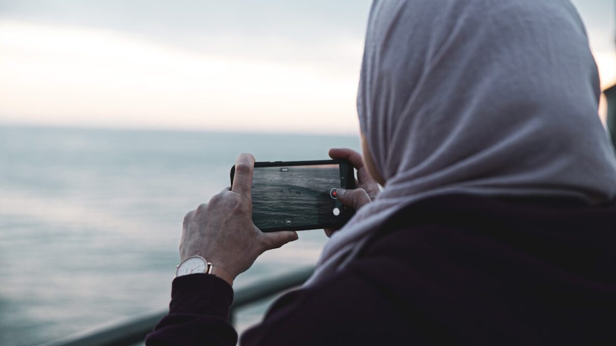 woman holding smartphone