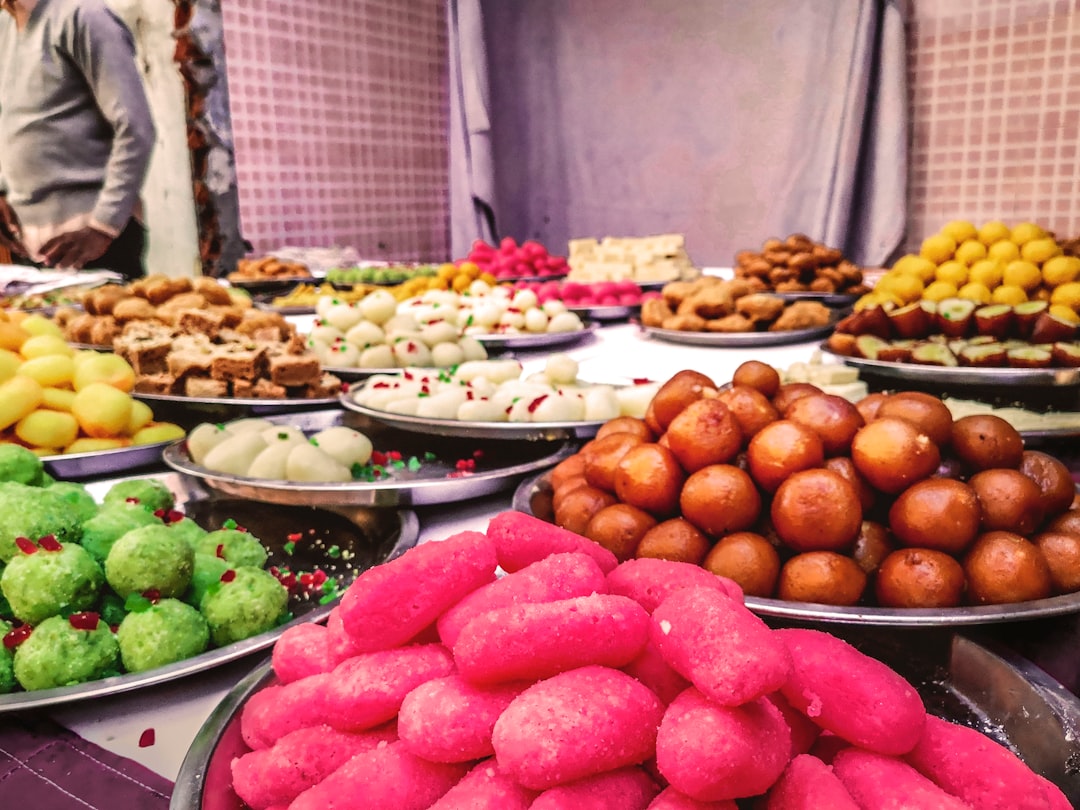 a table topped with lots of different types of donuts